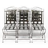 Six Paulton metal dining chars, each with tall arched back, of riveted lattice construction,