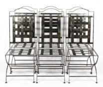 Six Paulton metal dining chars, each with tall arched back, of riveted lattice construction,