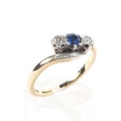 A 9ct gold and platinum sapphire and diamond ring. 2.5g. size M.