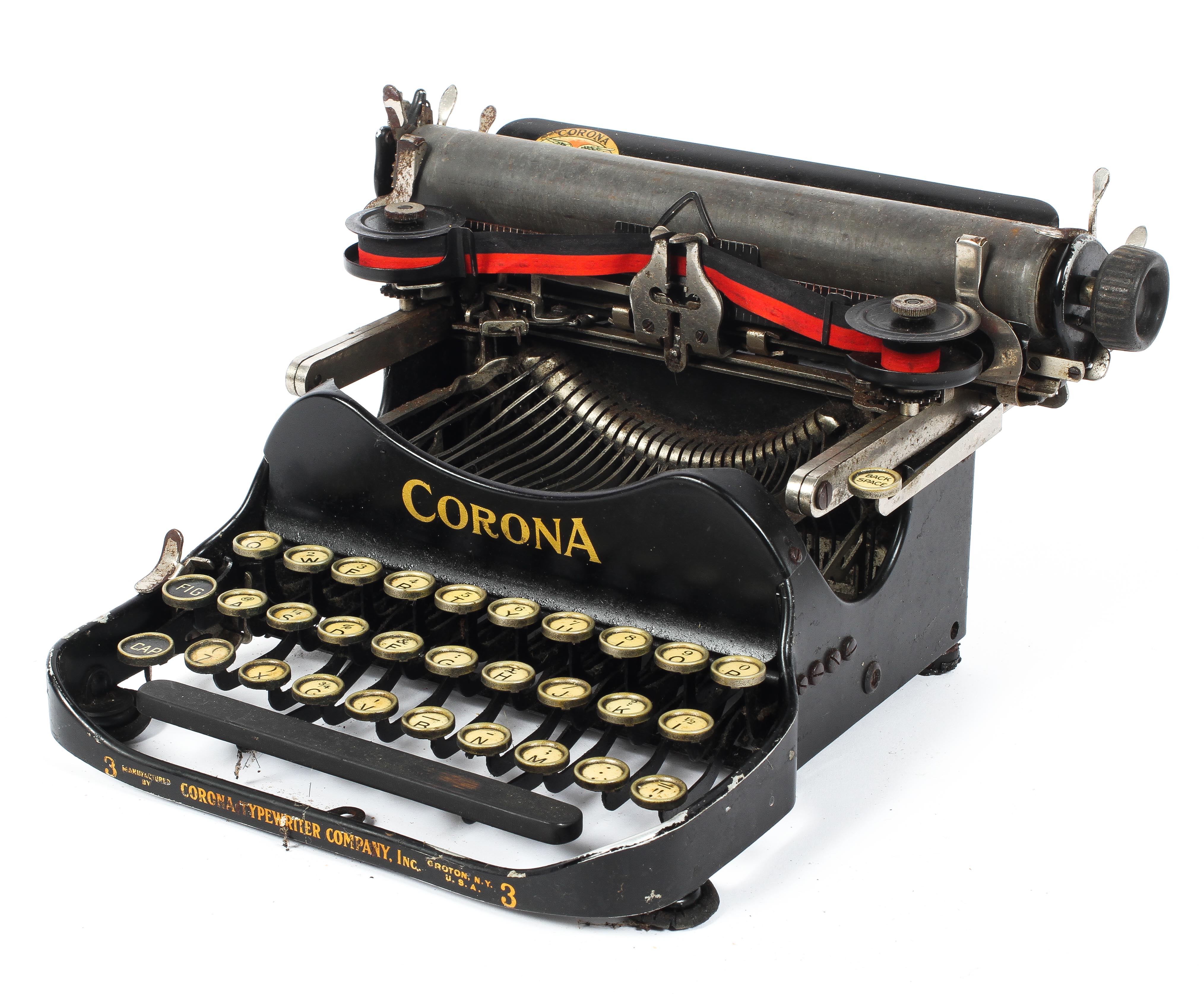A vintage Corona folding travel typewriter model 3,