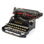 A vintage Corona folding travel typewriter model 3,