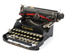 A vintage Corona folding travel typewriter model 3,