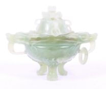 A jade coloured hardstone censor with carved dragon and loop handles. 16cm x 12cm.