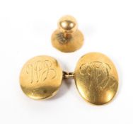 A single heavy gauge gentleman's cufflink together with a yellow metal stud. 10.6g.