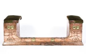 An Arts and Crafts copper and brass fireplace fender, late 19th century,