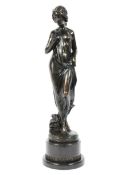 A 20th century bronze figure of a standing lady on circular cast bronze socle with marble base.