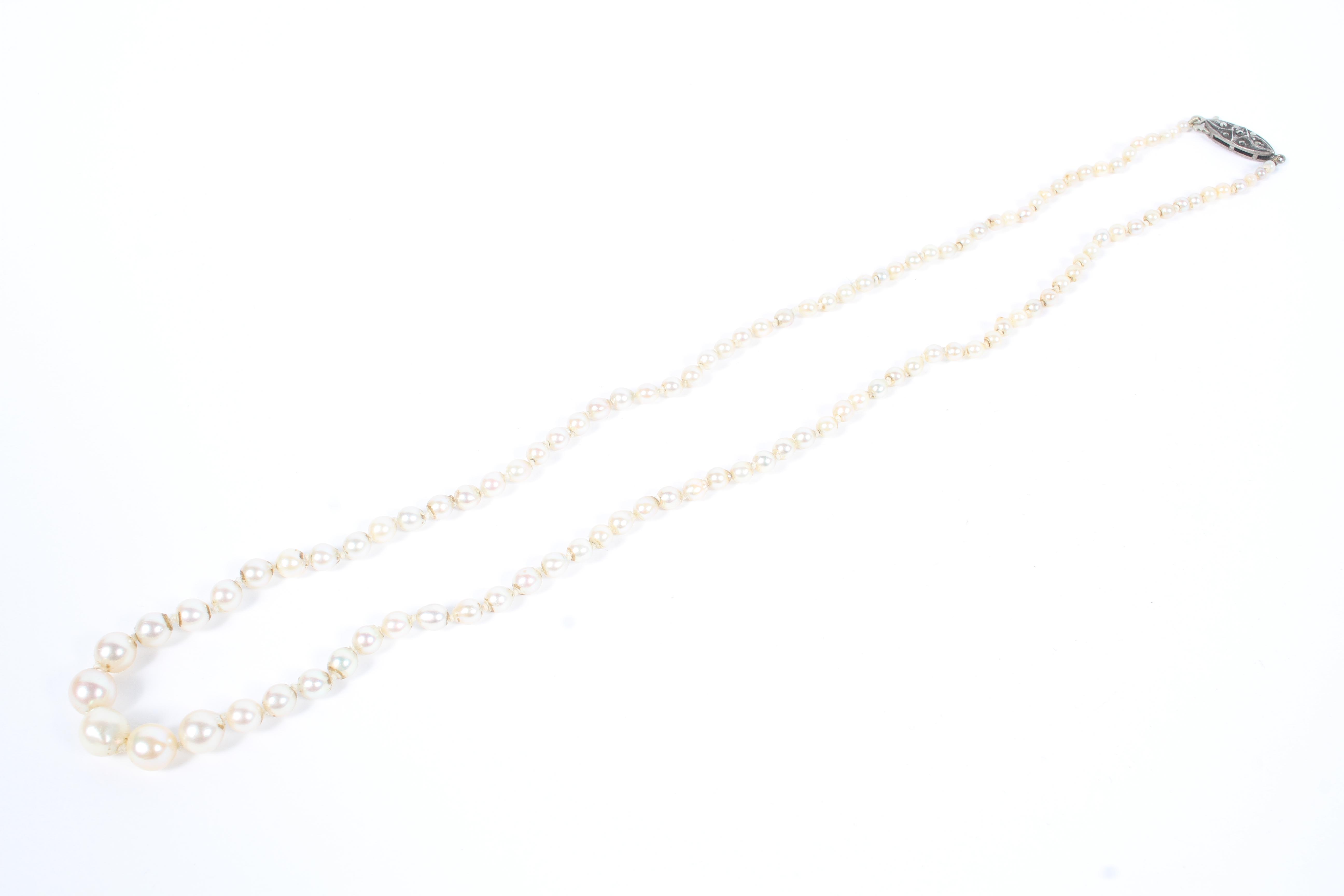 A strand of graduated cultured pearls an a marcasite clasp. 46cm.