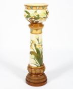 A Burmatofts Faience jardiniere on stand, late 19th century, impressed and painted marks,