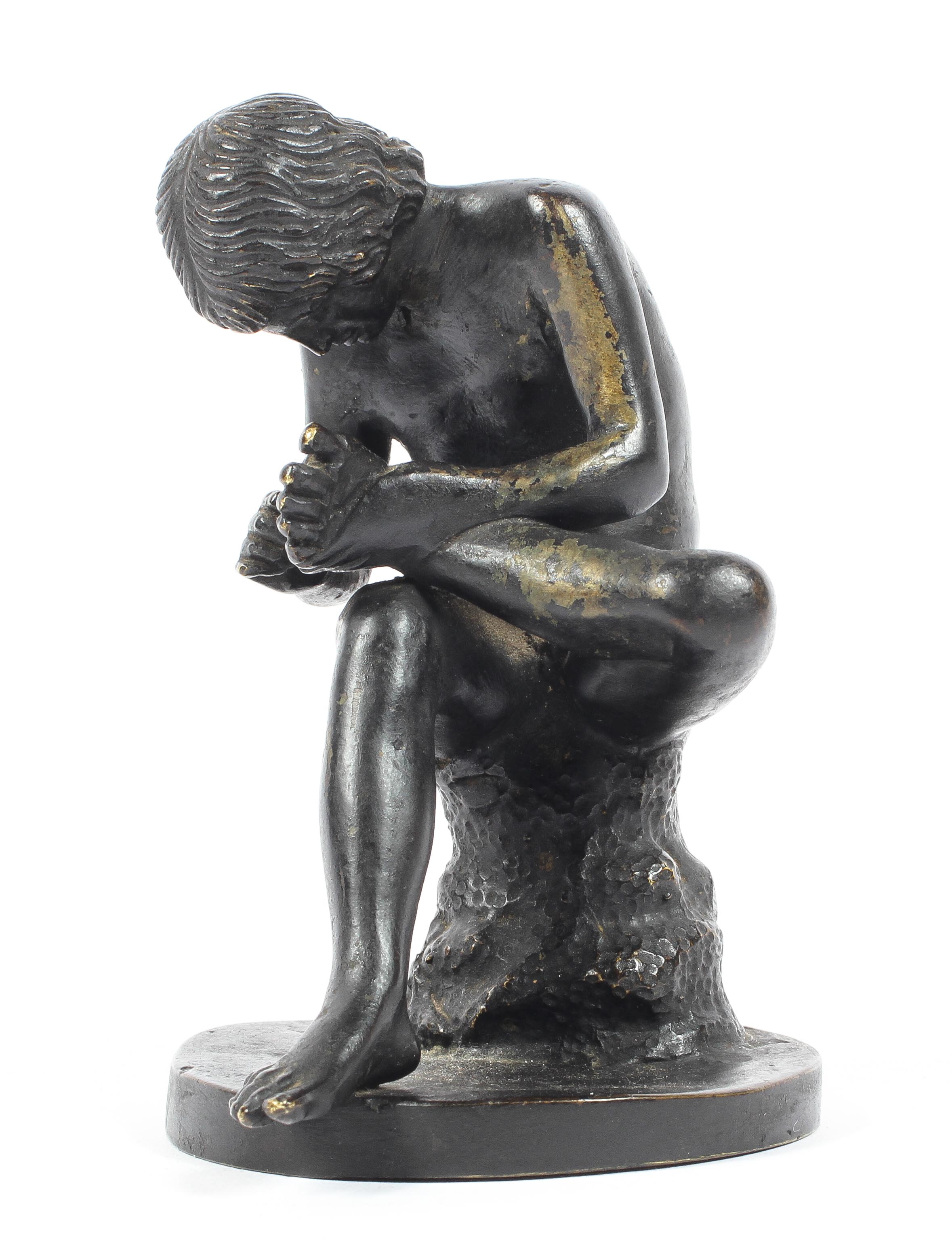 A late 19th/early 20th Century bronze 'Spinario' or 'Boy with Thorn in Foot', after the Antique.