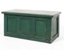 A vintage green painted pine small chest, panelled to sides,
