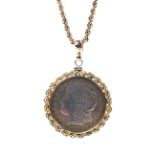 A yellow metal rope twist chain necklace with a yellow metal mounted 1921 US one dollar coin pendant