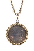 A yellow metal rope twist chain necklace with a yellow metal mounted 1921 US one dollar coin pendant