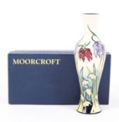 A contemporary limited edition Moorcroft vase, signed and dated to base 2004, edition 91/150,