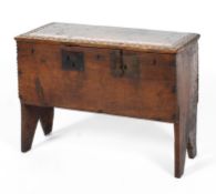 A small six plank oak coffer,17th/18th century, notch cut to the top and sides,