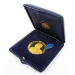 A 22ct gold. Anniversary of Dunkirk commemorative medal coin.