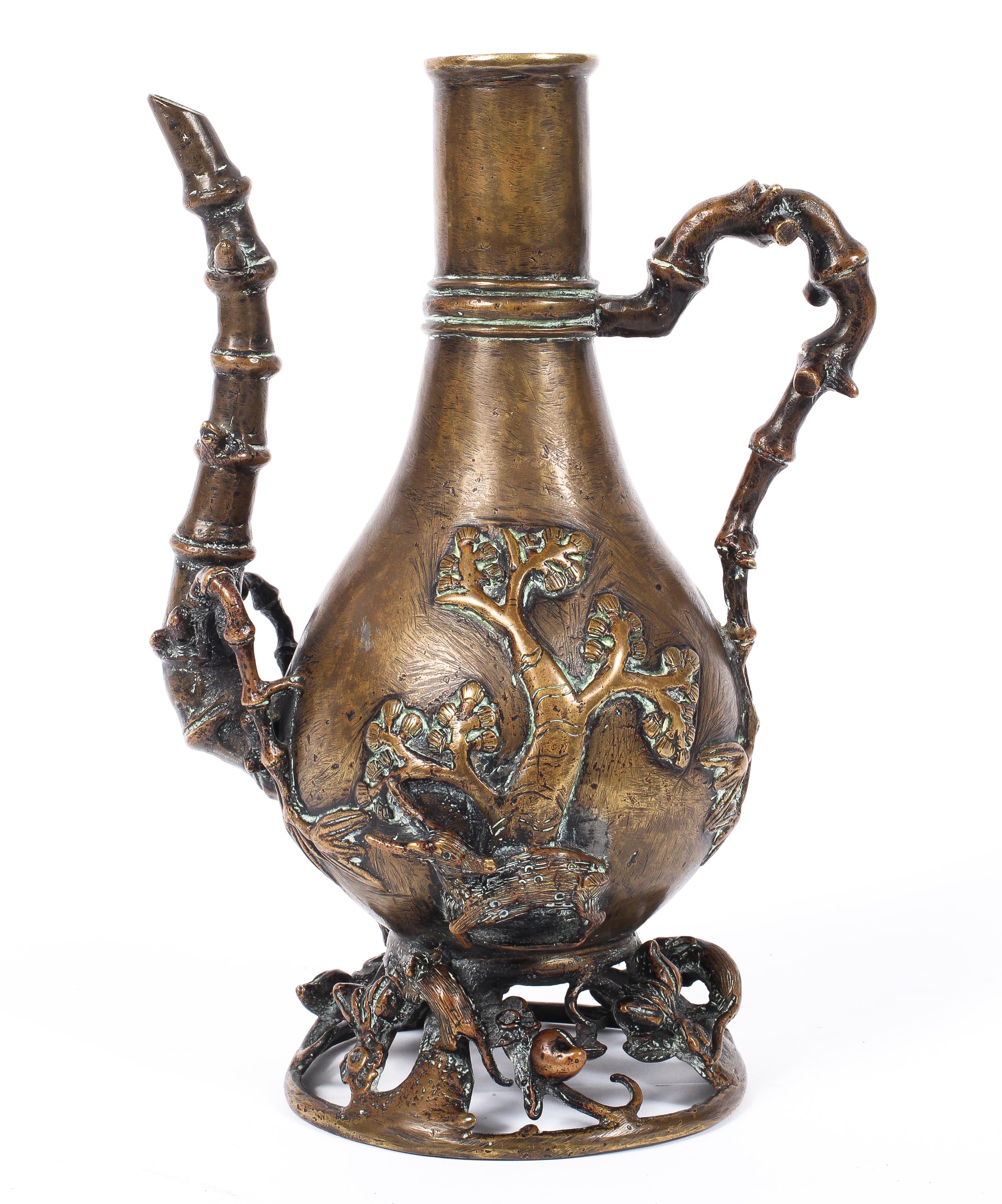 A bronze ewer of Turkish shape, 20th century, cast with branch handle and spout,
