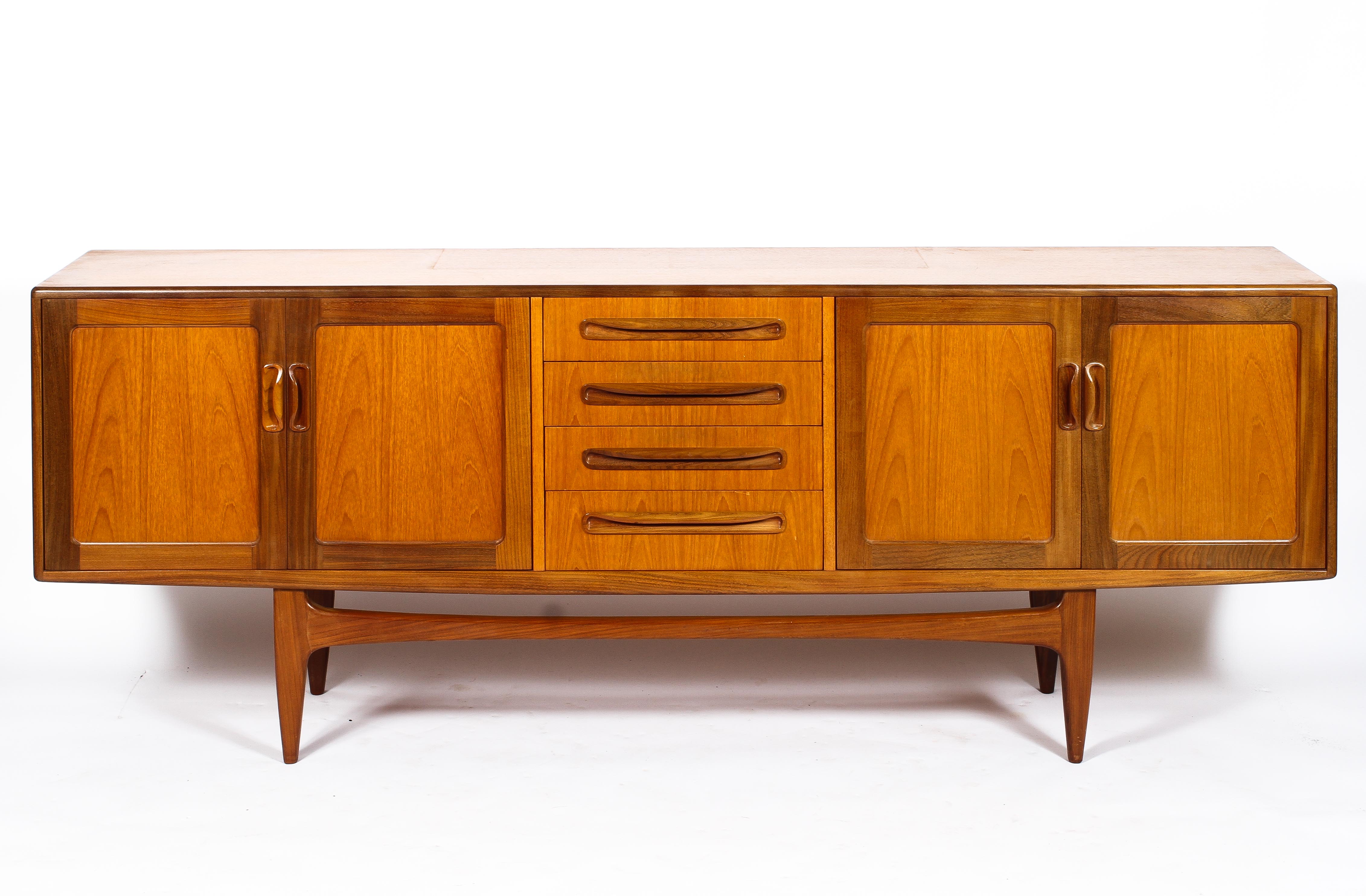 A mid-century G-Plan style teak veneered sideboard,