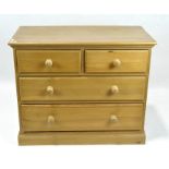 A contemporary pine chest of drawers, two short drawers above two longer drawers,