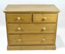 A contemporary pine chest of drawers, two short drawers above two longer drawers,