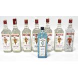 Seven bottles of Beefeater gin, together with another bottle of gin