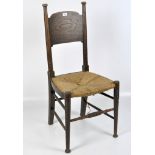 An Arts & Crafts chair in the Glasgow School manner by William Birch, High Wycombe,