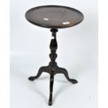 A Victorian mahogany circular occasional table, with tripod base,