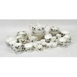 A Wedgwood part tea service in the 'Strawberry Hill' pattern, including cups and saucers, milk jugs,