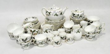A Wedgwood part tea service in the 'Strawberry Hill' pattern, including cups and saucers, milk jugs,