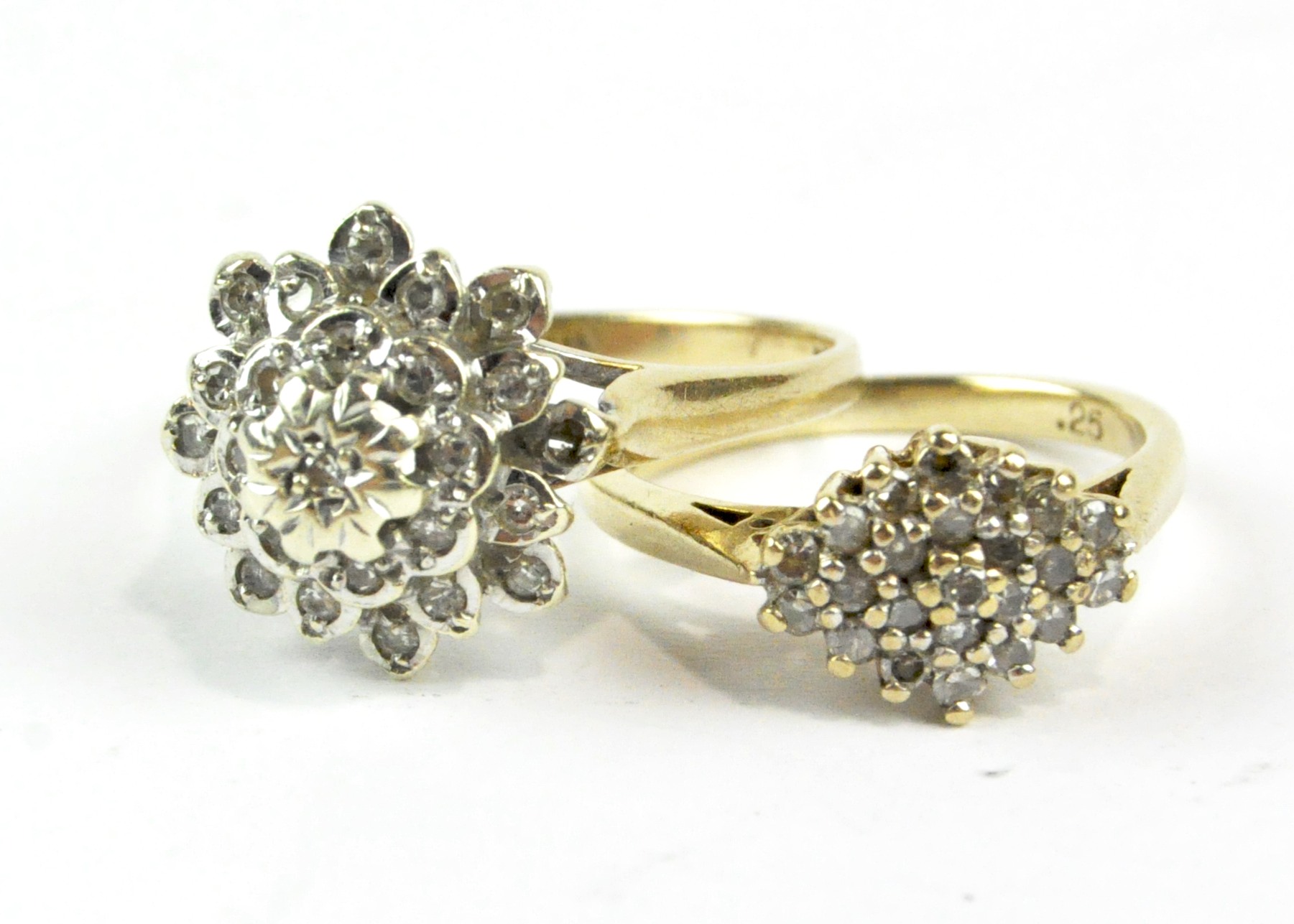 Two ladies 9ct gold cluster rings, one set with .25ct combined weight of diamonds, 5g.