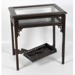 A 20th century bijouterie table, featuring carved fretwork,