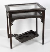 A 20th century bijouterie table, featuring carved fretwork,