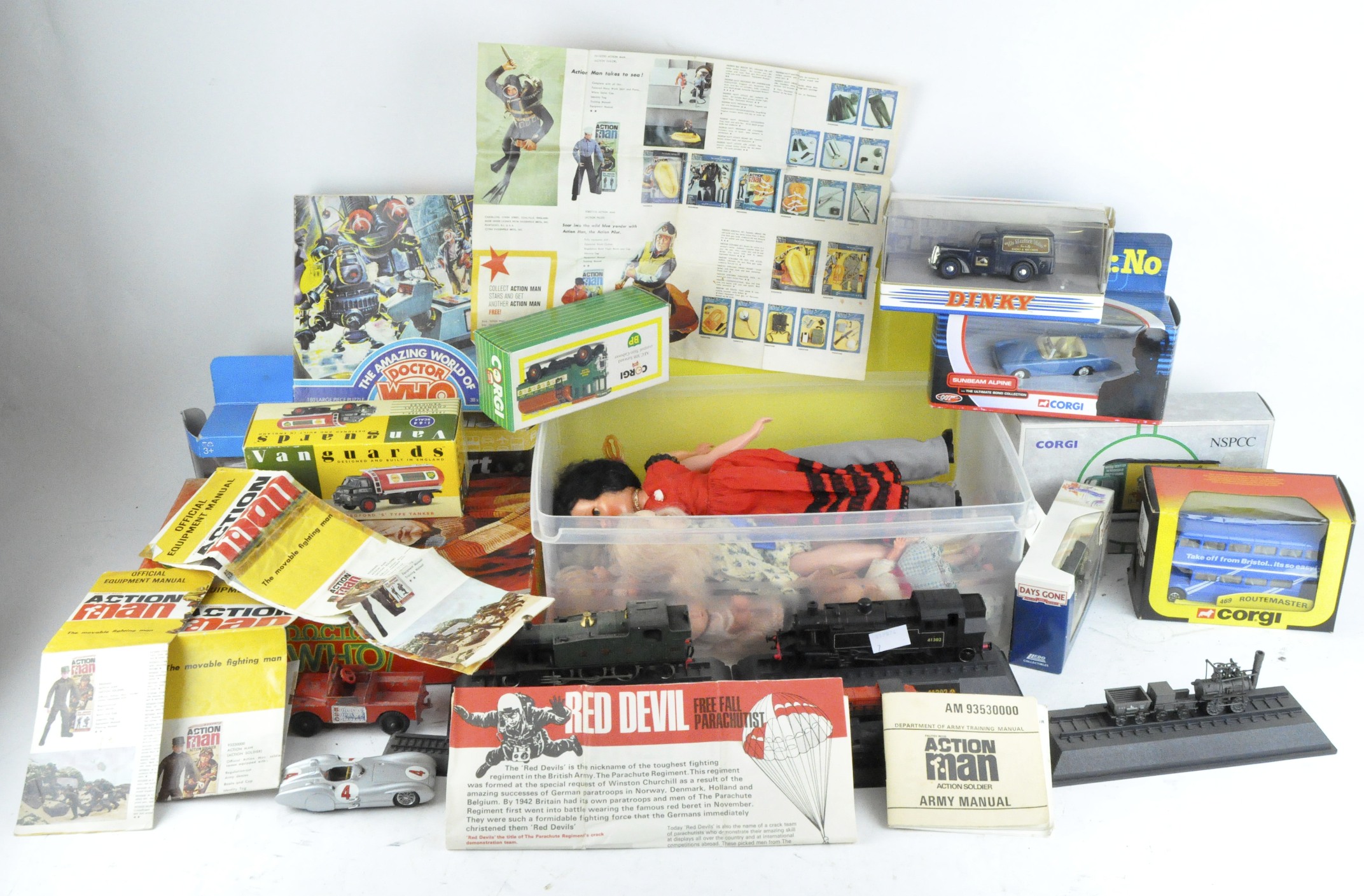 Box of vintage toys and trains including a Dr Who board game and puzzle,