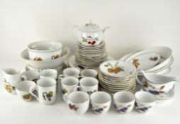 A selection of Royal Worcester Evesham ceramics, including cups and saucers, plates, a teapot,