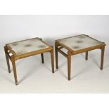 A pair of Retro tile topped teak occasional tables, on pegged tapering supports,