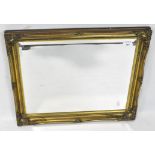 A reproduction bevelled edge wall mirror, of rectangular form,
