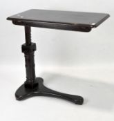 A late 19th/early 20th century Carters 'Invalid' wooden table, adjustable,