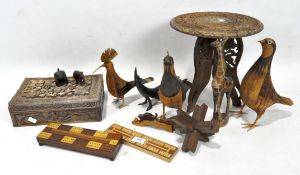 A collection of treen, including a carved box, tripod table and an minature elephant,