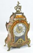 An elaborate reproduction clock in the Georgian style,