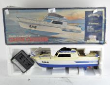 A vintage radio controlled Einco cabin cruiser,