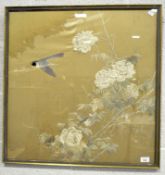A large Asian silk embroidery, depicting birds amongst roses, sewn in satin stitch on a gold ground,