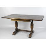 A 20th century oak refectory table, with turned edges and corners,