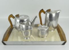 A mid-century four piece Picquot ware set including tea and coffee pot with wooden handles,