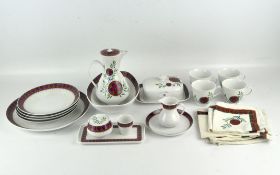 A retro Furstenberg Germany part dinner service decorated in red, green and blue,