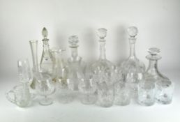 A large selection of glassware, including decanters, beakers, wine glasses,