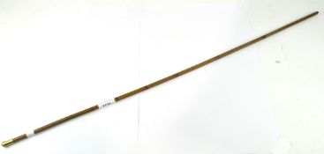 A Victorian yellow metal mounted swagger stick, the top engraved June 15th 1866, 83cm long.