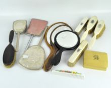 A collection of mirrors and brushes of wood,