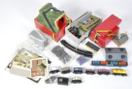 A collection of Hornby OO Gauge freight stock and accessories