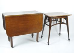 A mahogany drop leaf table, with rounded edges and on square supports, with an occasional table