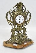 A Victorian Rococo style mantle clock,