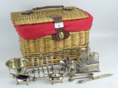 A selection of silver plated wares, including a toast rack,